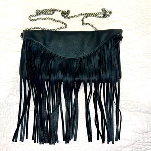 Bam Forever Black purse, may be used with a strap or strapless.